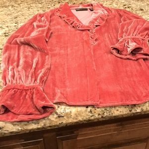 Soft velvety feel blouse. En trend style.blouson sleeve, ruffles on collar .